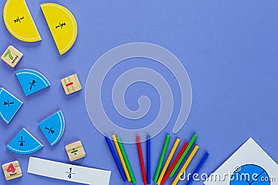 Creative Ð¡olorful math fractions on violet background. Interesting funny math for kids. Education, back to school Stock Photo